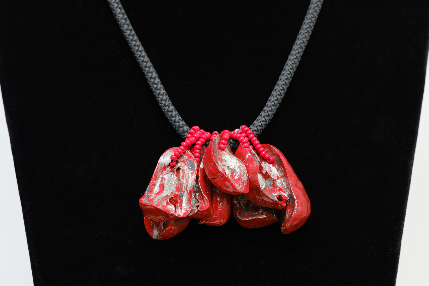 Cluster of Kolanuts Made With Red and Silver Paint and Silver Metallic Foil