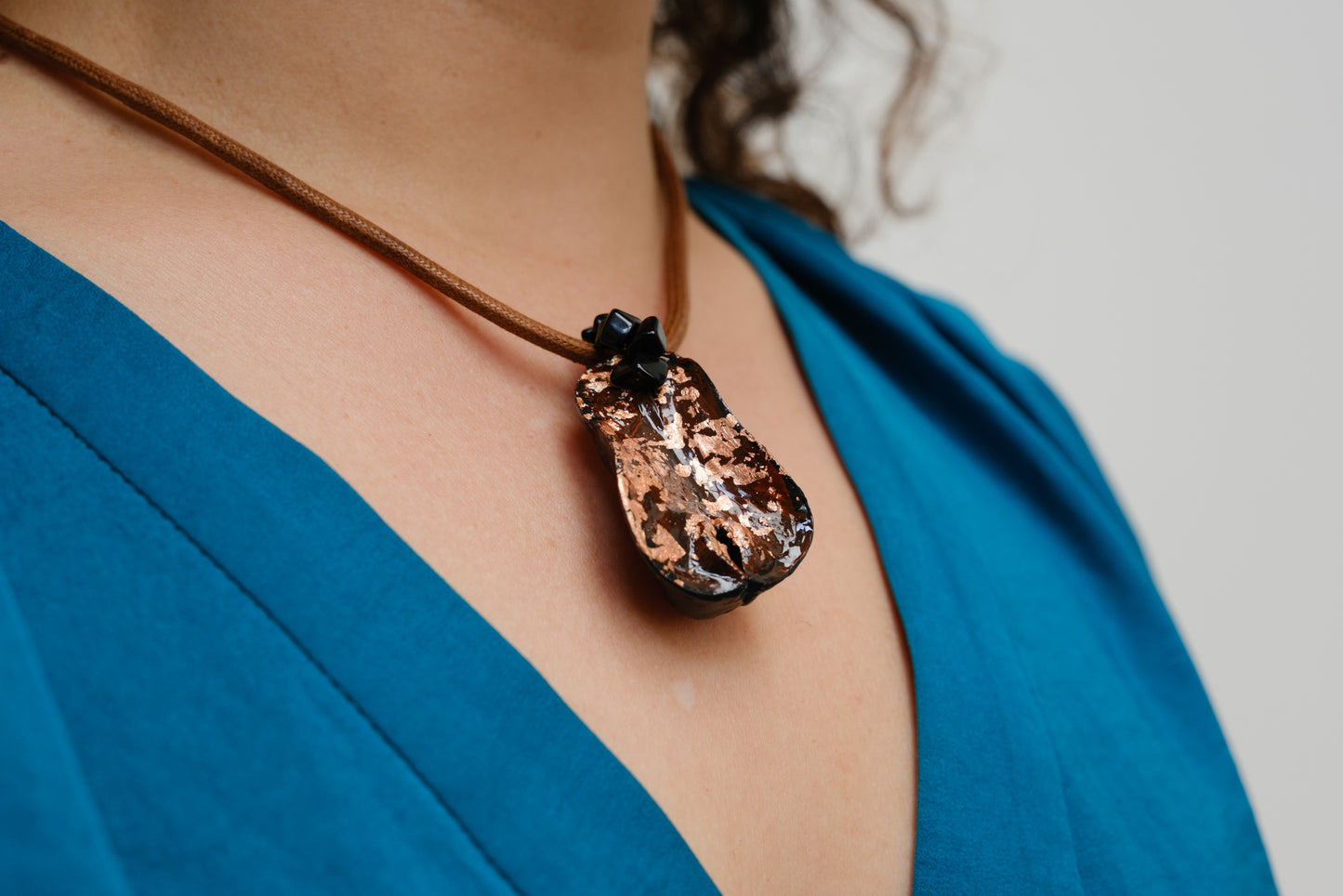 Kolanut Pendant with Cotton Cord and Gemstones, Painted with Enamel Paint and Metallic Leaf