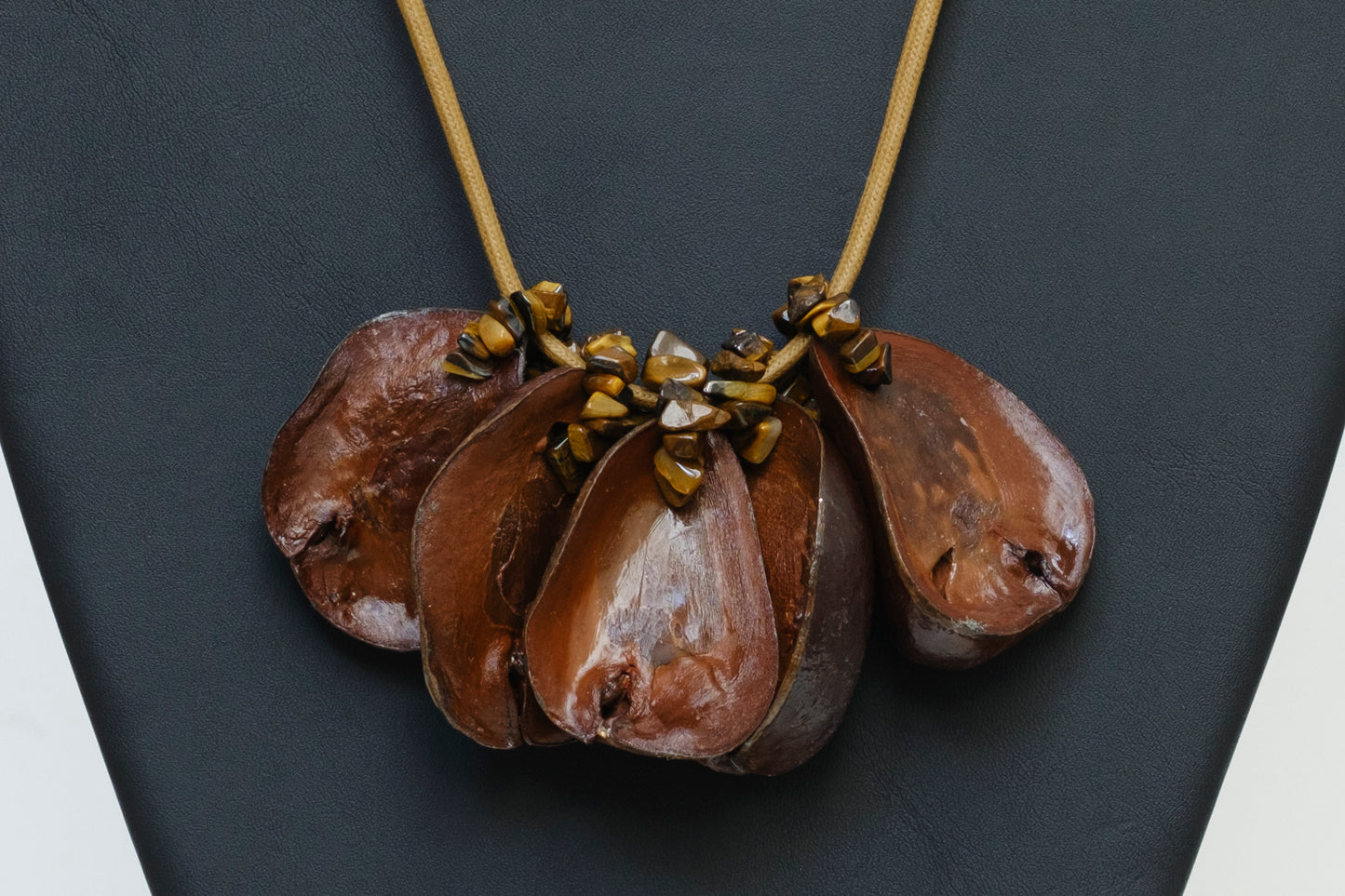 Cluster of Kolanuts with Tiger Eye Gemstones