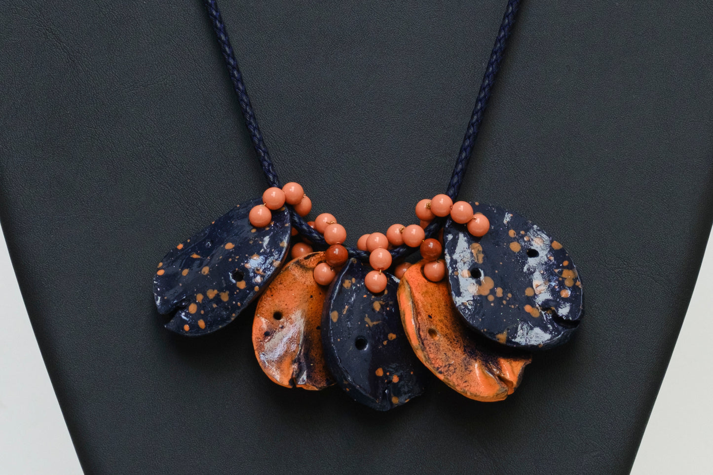 Cluster of Kolanuts Painted with Indigo and Orange