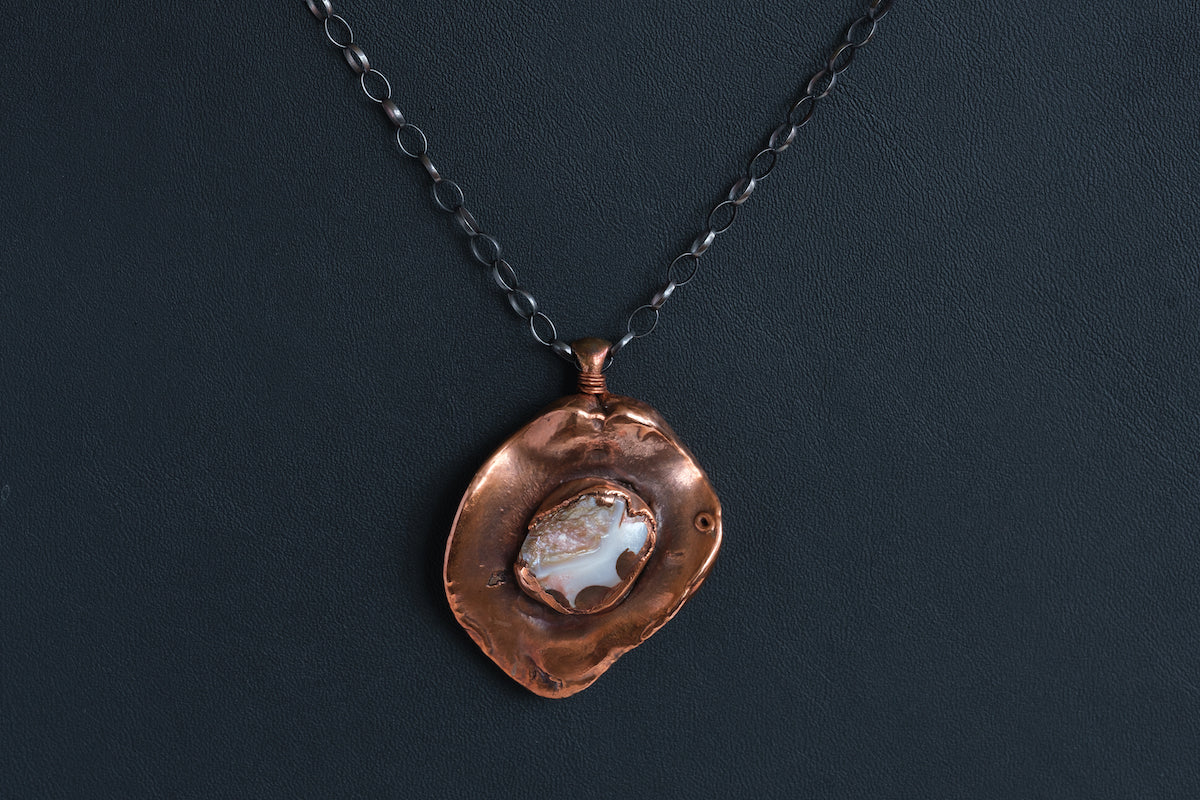 Kolanut with Mother of Pearl Pendant