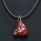 Kolanut Pendant Painted with Red Paint and Silver Leaf